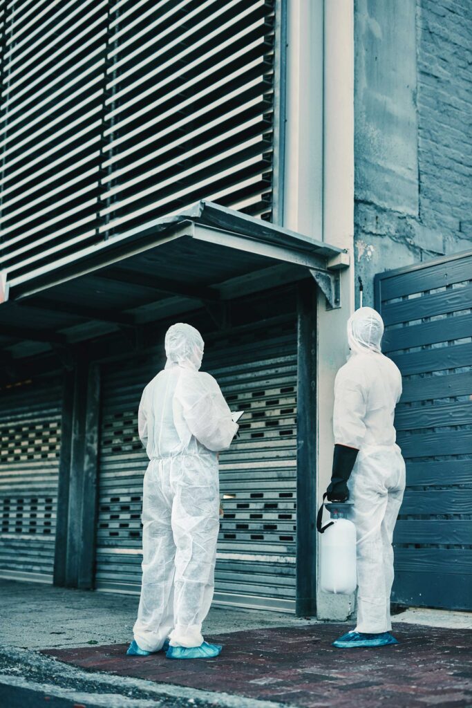 Two inspectors inspecting a building to keep the cleanliness.