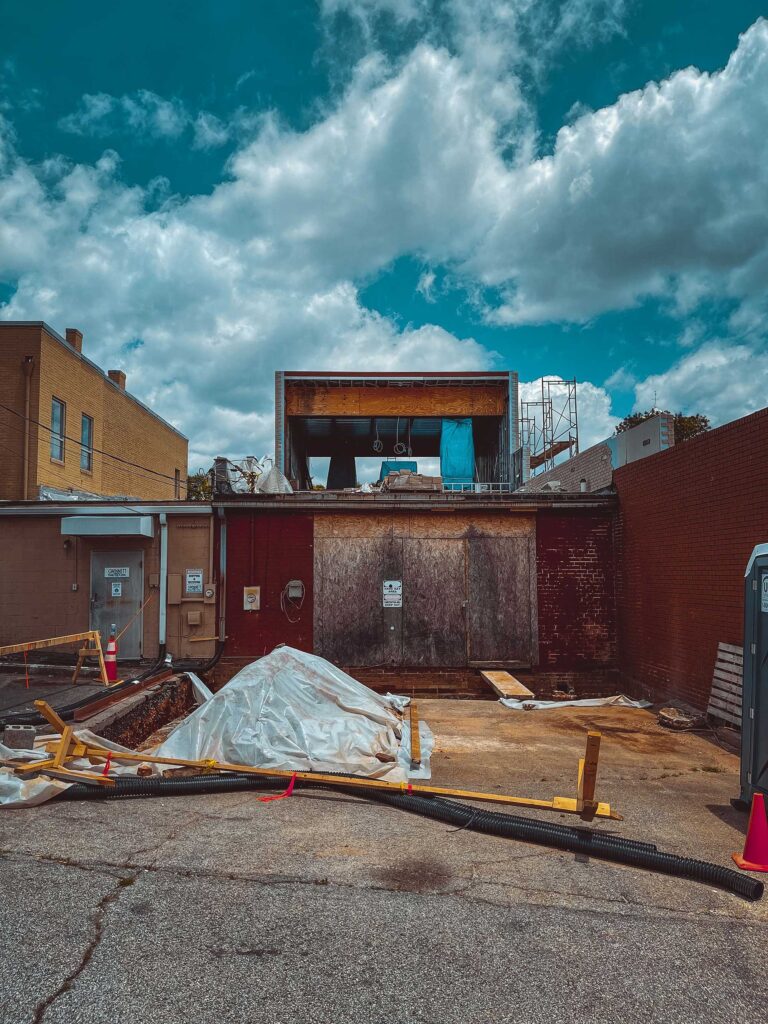 A vertical shot of a construction site during daytime.