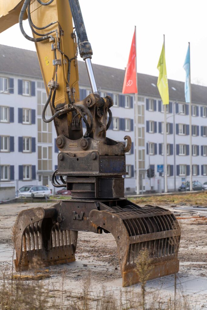 A vertical shot of an excavator.